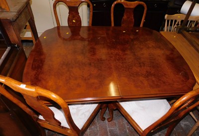 Lot 1060 - A mahogany extending dining table, on a turned...