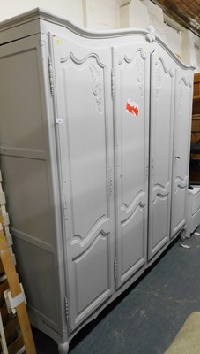 Lot 1092 - A grey painted four door wardrobe, in the...