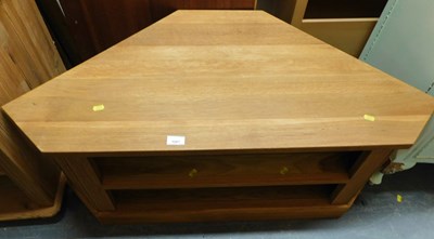 Lot 1067 - A contemporary light oak corner television...