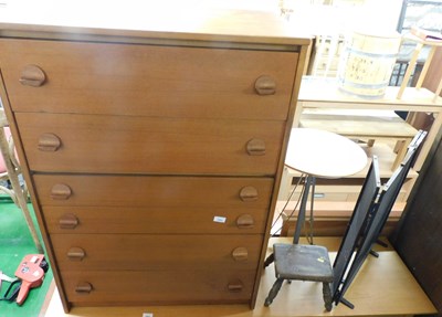 Lot 1085 - A teak six drawer chest, 106cm high, 75cm wide,...