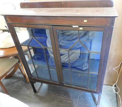 Lot 1081 - A 20thC mahogany display cabinet, the top with...