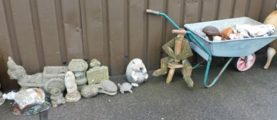 Lot 1130 - A group of concrete garden ornaments, to...