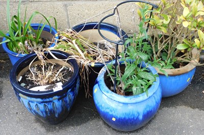 Lot 1158 - A group of blue glaze plant pots, some...