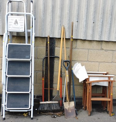 Lot 1162 - Three ladders, together with garden tools,...