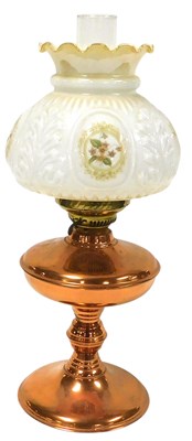 Lot 216 - An early 20thC duplex copper oil lamp, with...
