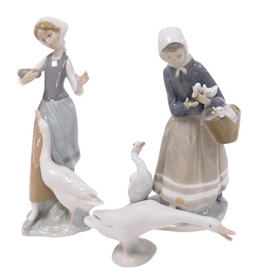 Lot 223 - A Lladro porcelain figure of a girl with a...