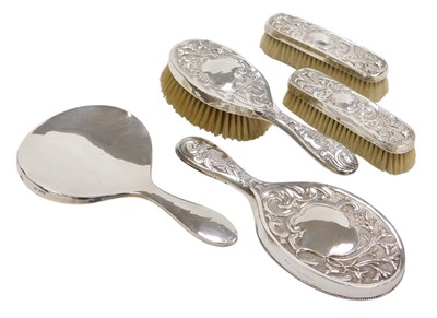 Lot 251 - An Edward VII silver backed four piece...