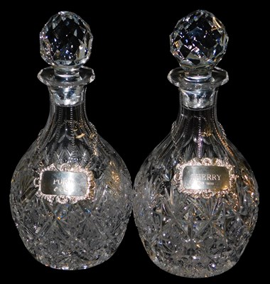 Lot 250 - A pair of cut glass decanters and stoppers,...