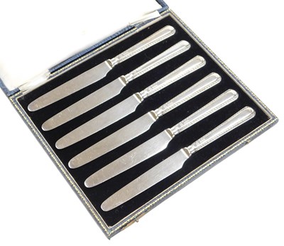 Lot 256 - A set of six George V silver handled...