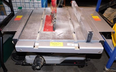 Lot 358 - A flat bed electric circular saw.