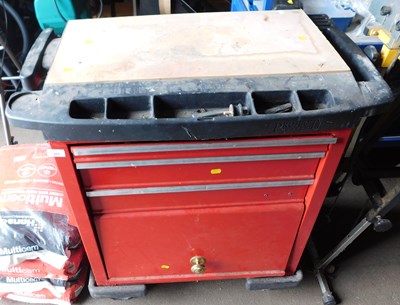 Lot 359 - A red metal tool chest, with three graduated...