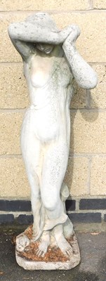 Lot 366 - A composition stone garden statue, modelled as...