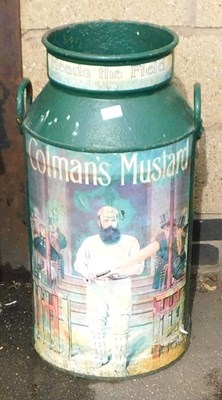 Lot 370 - A green painted twin handled milk churn, later...