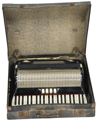 Lot 243 - An Orfeo piano accordion, in a black casing,...