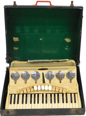 Lot 245 - A Scandalli piano accordion, in a yellowed...