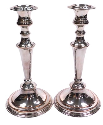 Lot 278 - A pair of Victorian silver plated candlesticks,...