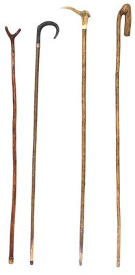 Lot 288 - Four walking sticks, two with horn handles.