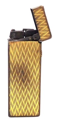 Lot 297 - A Dunhill brass pocket lighter, with engraved...