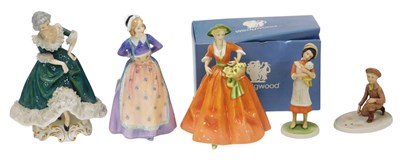 Lot 335 - A Royal Doulton figure, modelled as Susan,...