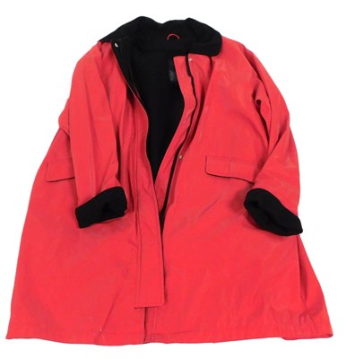 Lot 382 - A Dennis Basso lady's red raincoat, size XL.