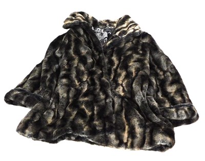 Lot 384 - A Dennis Baso lady's faux fur coat, size 2XL.