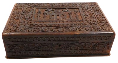 Lot 389 - An early 20thC Indian hardwood box, carved to...