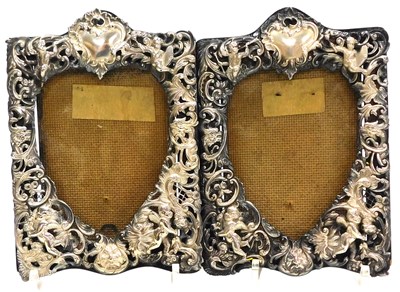 Lot 397 - A pair of Victorian silver strut photograph...