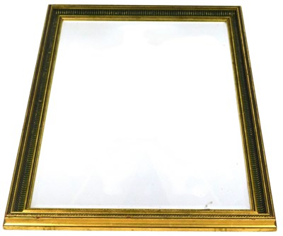 Lot 457 - A rectangular gilt wood wall mirror, with a...