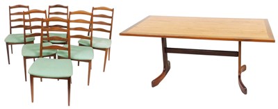 Lot 461 - A G-Plan teak rectangular dining table, raised...