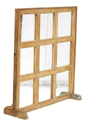 Lot 469 - An early 20thC limed oak and mirrored...
