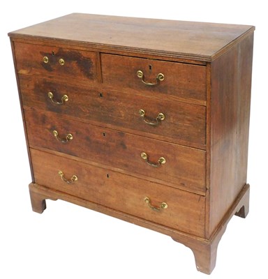 Lot 483 - A George III oak chest, of two short above...