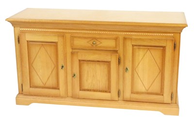 Lot 490 - A Karel Mintjens light oak dining room suite,...