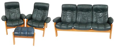 Lot 522 - An Ekornes Stressless light oak and green...
