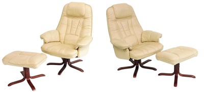 Lot 524 - A pair of Mobelteam cream leather swivel...