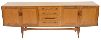 Lot 528 - A G-Plan teak sideboard, with four central...
