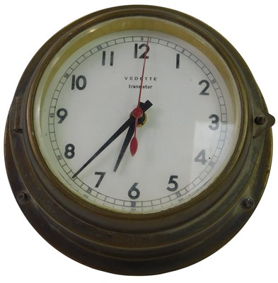 Lot 112 - A Vedette transistor brass cased ship's clock,...