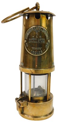 Lot 140 - A brass Protector Lamp & Lighting Company Ltd...