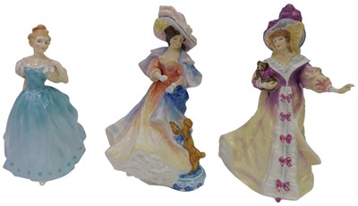 Lot 143 - Three Royal Doulton porcelain figures,...