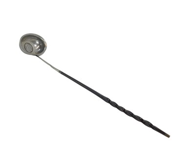 Lot 308 - A Georgian toddy ladle, the bowl inset with a...