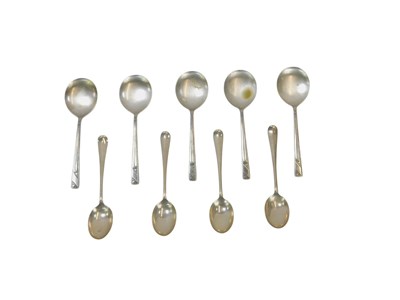 Lot 311 - A set of five Elizabeth II silver soup spoons,...