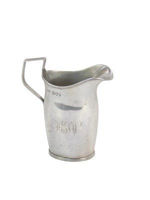 Lot 318 - A Victorian silver cream jug, with fluted rim,...
