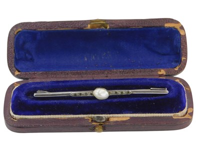 Lot 89 - A bar brooch, set with a baroque pearl, in...