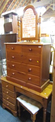 Lot 1002 - A small pine style chest, of two short over...