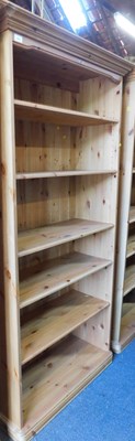 Lot 1009 - A pine bookcase with five adjustable shelves,...