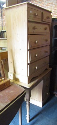 Lot 1048 - A pine chest of two short over four long...