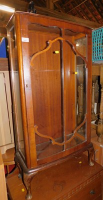 Lot 1027 - An early 20thC walnut display cabinet, with...