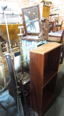 Lot 1057 - A small toilet mirror, on base, terminating in...