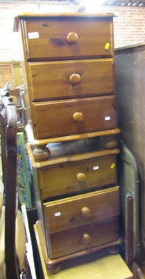 Lot 1058 - A pair of pine three drawer chests,...