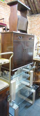 Lot 1078 - A small magazine rack, a two drawer over two...