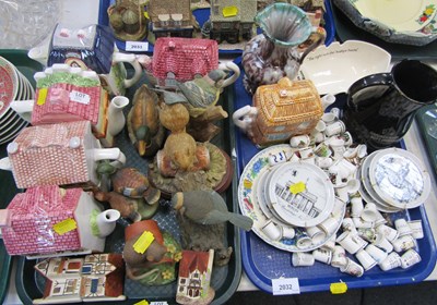 Lot 2032 - Ceramics, in the form of teapots, shape of...